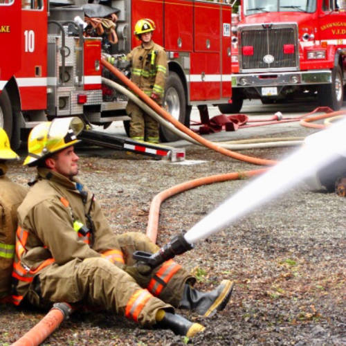 Firefighter on Fire Hose